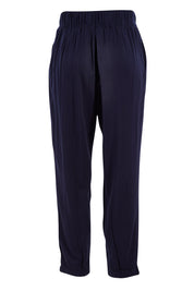 Product shot of the Nice Pant in colour Navy (Blue), from the back