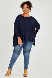 Model Alexis wearing size OneSize of the Long Sleeve Essential Top in colour Navy (Blue), from the front, showing the whole outfit
