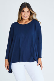 Model Palatina wearing size OneSize of the Long Sleeve Essential Top in colour Navy (Blue), from the front, cropped image