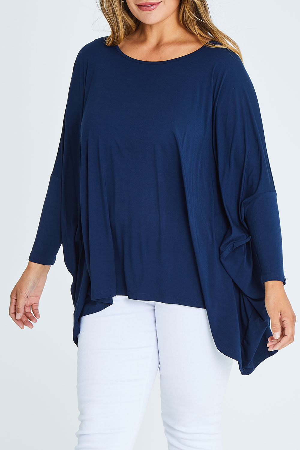 Model Palatina wearing size OneSize of the Long Sleeve Essential Top in colour Navy (Blue), from the front, cropped image