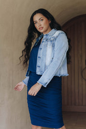 A model wearing the Denim Jacket in colour LightBlue (Blue), from the front, showing the whole outfit