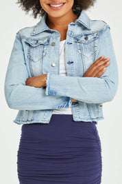 Model Olivia wearing size S of the Denim Jacket in colour LightBlue (Blue), from the front, cropped image