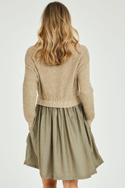 Model Alice wearing the Lunar Knit Dress in colour Walnut (Green), from the back