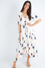 Model Gemma wearing the S/S Peak Maxi Dress in colour Peachbree (Blue), from the front, showing the whole outfit