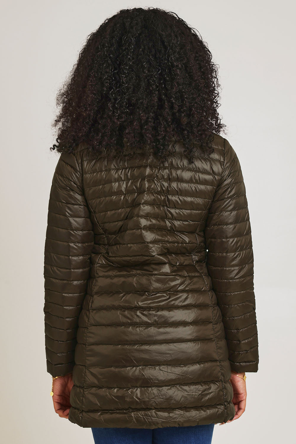 Model Ziara wearing size 10 of the Funnel Neck Down Jacket in colour Khaki (Green), from the back