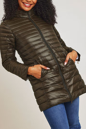 Model Ziara wearing size 10 of the Funnel Neck Down Jacket in colour Khaki (Green), from the front, cropped image