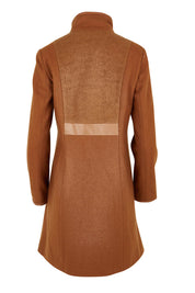 Product shot of the Multi Fabric Jacket in colour Latte, from the back