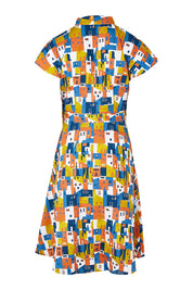 Product shot of the Kelly Dress in colour Houses (Blue), from the back