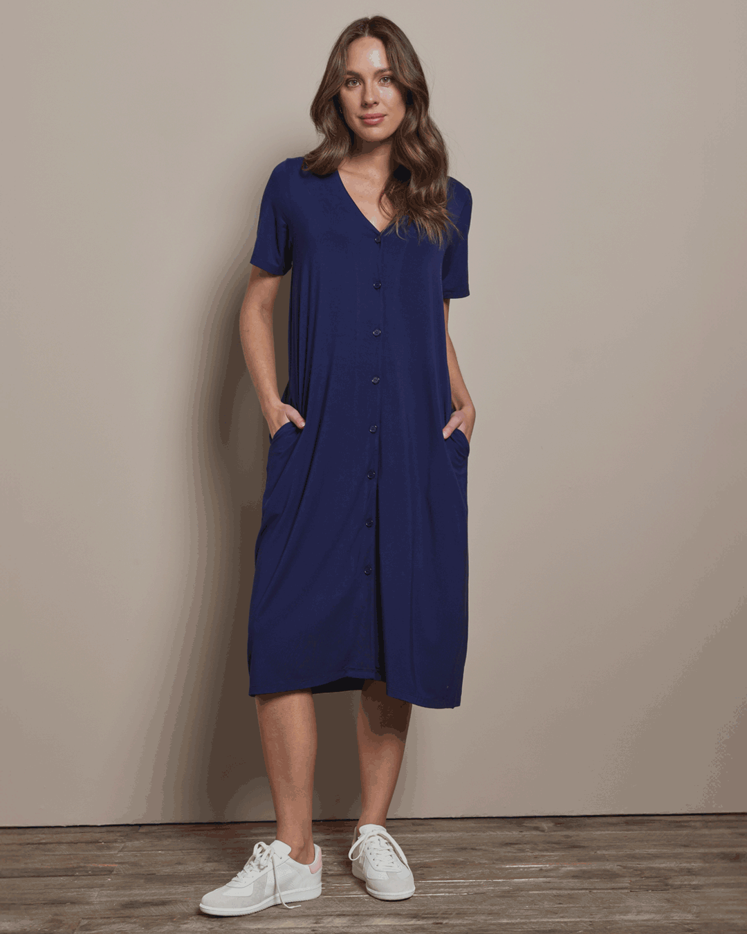 Pack-and-go-button-up-dress-navy_1036195e-9df0-4762-b962-9216cf956b32.gif