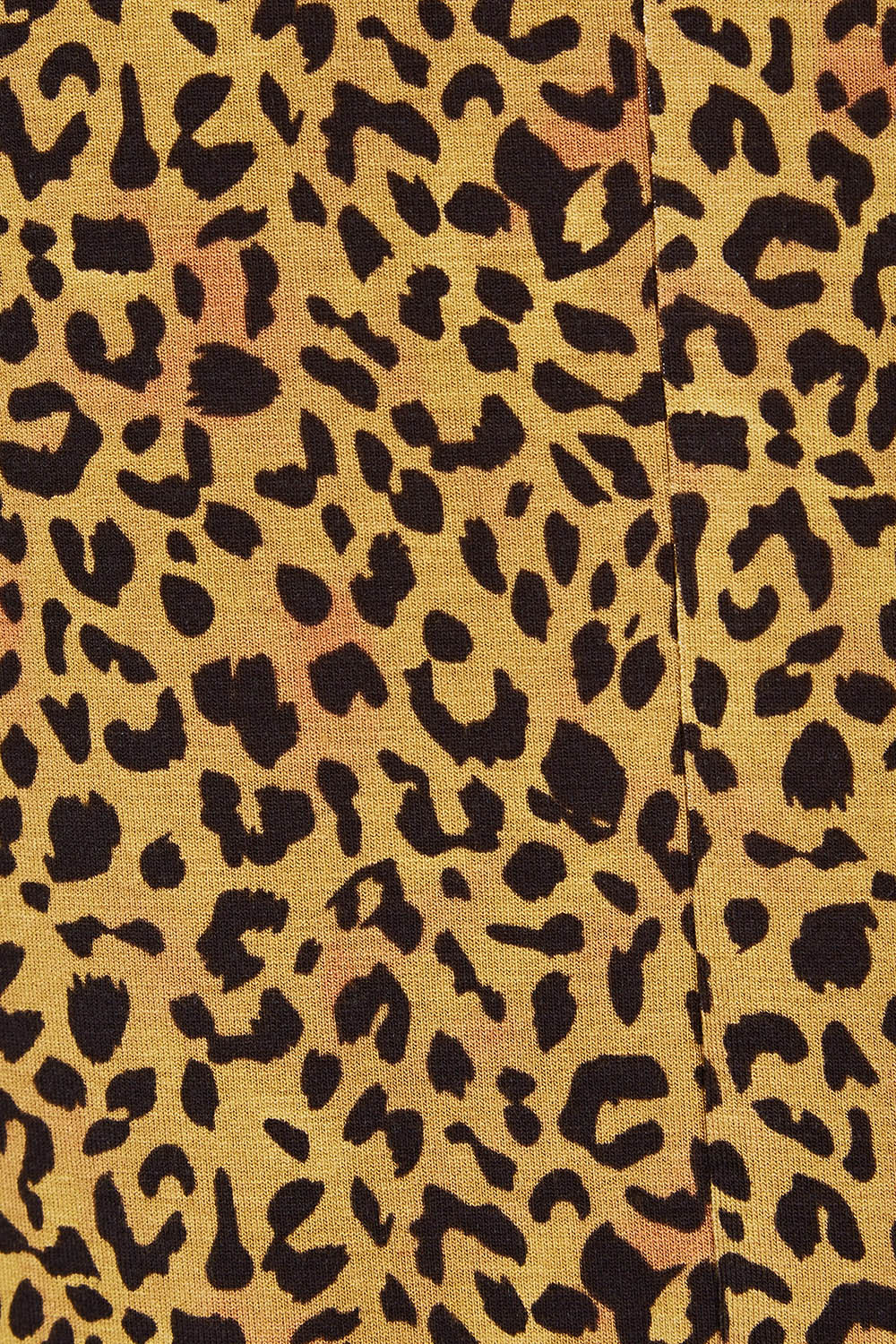 Product shot of the Maui Tee in colour Wildprint (Black), detail