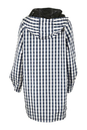 Product shot of the Rosie Raincoat in colour Navychequ (Blue), from the back