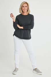 Model Sandy wearing size 10 of the Lucy French Terry Sweat in colour Gunmetal (Grey), from the front, showing the whole outfit