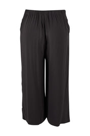 Product shot of the Alison Pant in colour Petrol (Black), from the back
