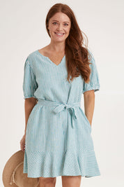 Model Sally wearing size 10 of the Birdie Dress in colour Tealstripe (Green), from the front, cropped image