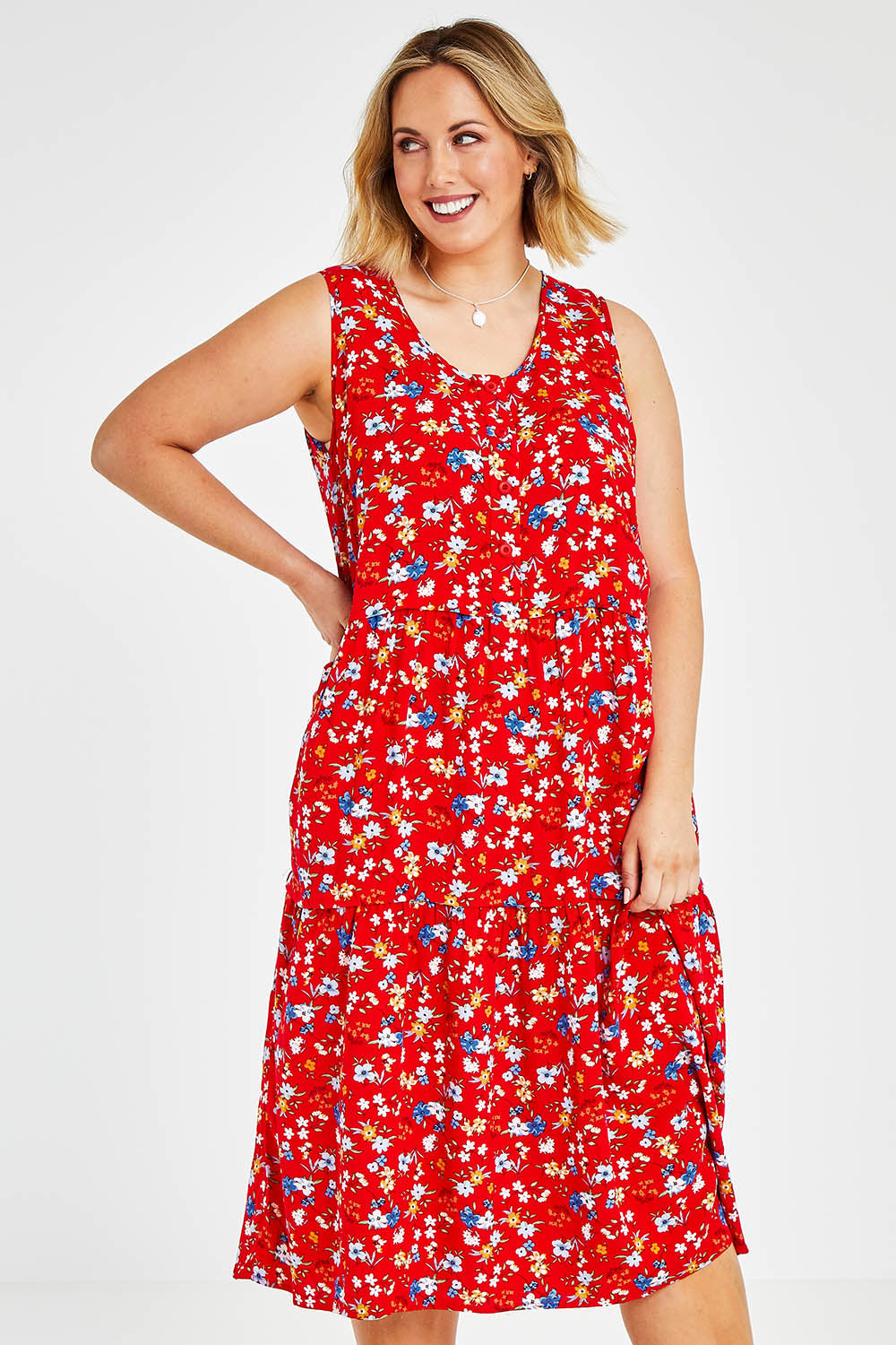Model Jess wearing size 14 of The Print Layered Maxi in colour Redfloral (Red), from the front, cropped image