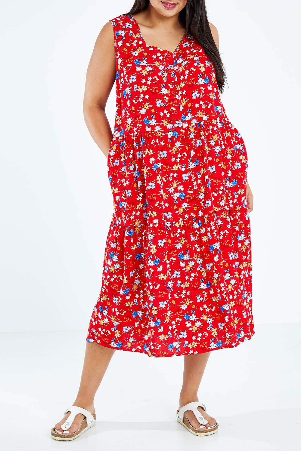Model Sasha-Lee wearing size 16 of The Print Layered Maxi in colour Redfloral (Red), from the front, cropped image