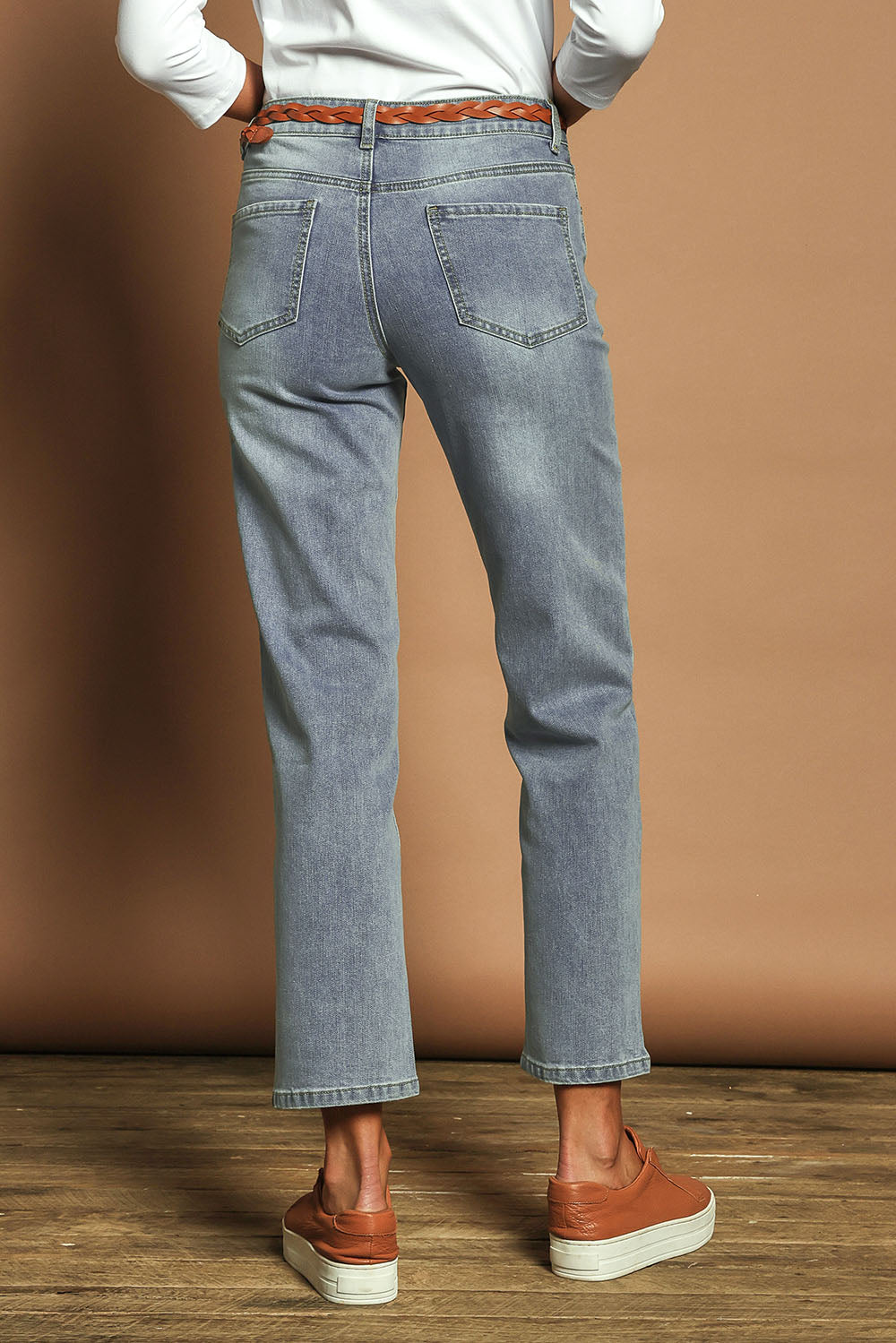 Model Madeline wearing size 10 of The Boyfriend Jean in colour Blue (Blue), from the back