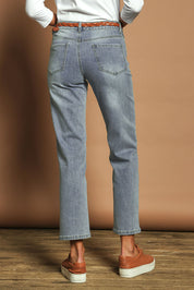 Model Madeline wearing size 10 of The Boyfriend Jean in colour Blue (Blue), from the back