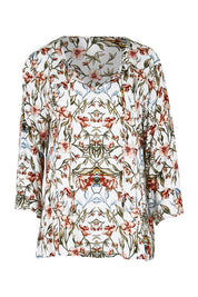 Product shot of The V Neck Printed Top in colour Peachprint (White), from the front
