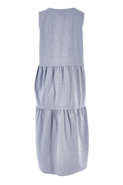 Product shot of The Chambray Tiered Dress in colour Chambray (Blue), from the back