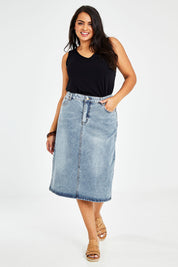 Model Sasha-Lee wearing size 16 of The Midi Denim Skirt in colour Denim (Blue), from the front, showing the whole outfit