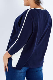 Model Sasha-Lee wearing size XL of The 2 Tone Jumper in colour Navy (Blue), from the back