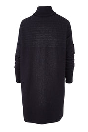 Product shot of The Cable Knit Dress in colour Blackfleck (Black), from the back