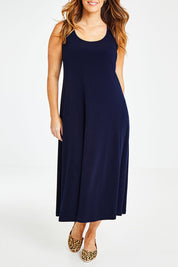 Model Laura wearing size 14 of The Recycled A Line Midi Dress in colour Navy (Blue), from the front, cropped image
