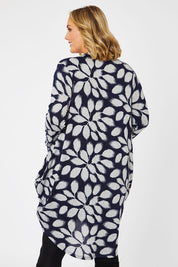 Model Jess wearing size 14 of The Cosy Pocket Detail Dress in colour Navyleaf (Blue), from the back