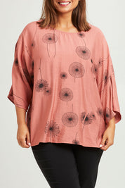 Model Monique wearing size 14 of The Relax Fit Printed Top in colour Rosecopper (Pink), from the front, cropped image