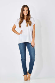 Model Anna wearing size 10 of The Everyday Jegging in colour Denim (Blue), from the front, showing the whole outfit