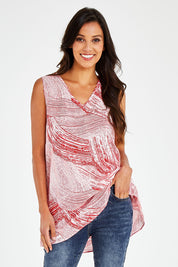 Model Vitoria wearing size 10 of The Trapeze Print Top in colour Redwhite (Red), from the front, cropped image