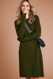Model Alice wearing size S of The Everyday Knit Midi Dress in colour Deepkhaki (Green), from the front, showing the whole outfit