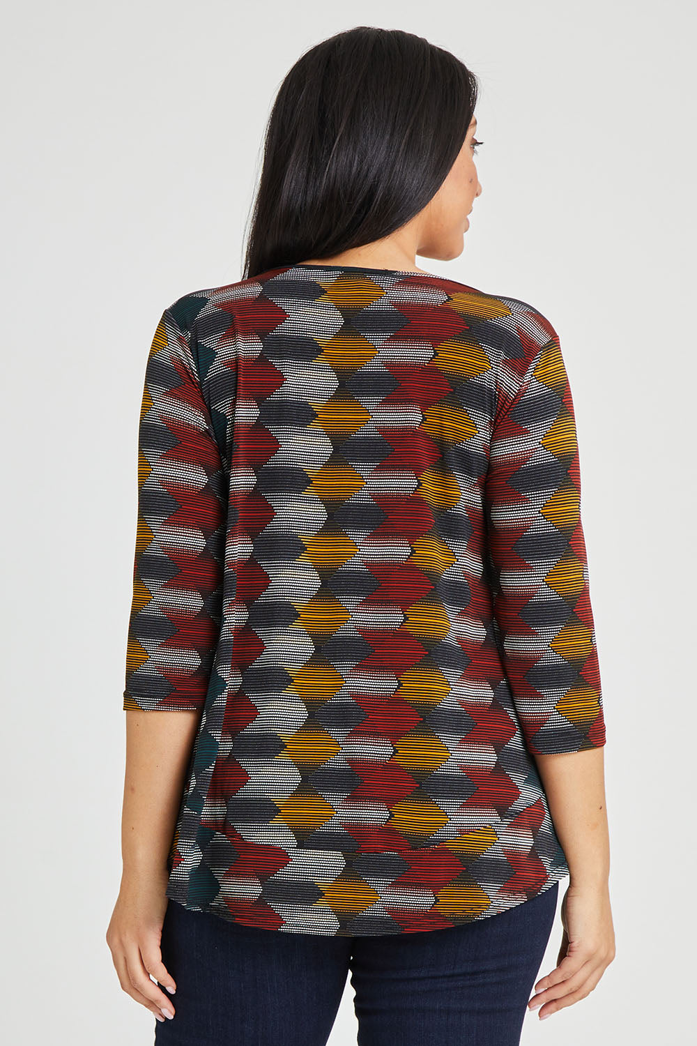 Model Terri-Leigh wearing size 14 of The Printed Jersey 3/4 Sleeve Swing Tee in colour Multiprint (Black), from the back