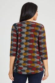 Model Terri-Leigh wearing size 14 of The Printed Jersey 3/4 Sleeve Swing Tee in colour Multiprint (Black), from the back