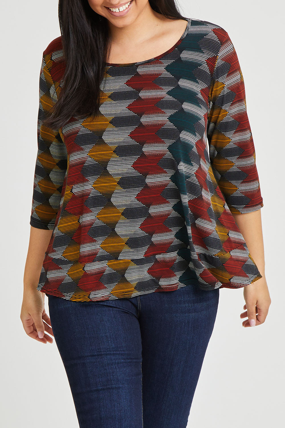 Model Terri-Leigh wearing size 14 of The Printed Jersey 3/4 Sleeve Swing Tee in colour Multiprint (Black), from the front, cropped image