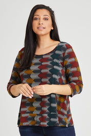 Model Terri-Leigh wearing size 14 of The Printed Jersey 3/4 Sleeve Swing Tee in colour Multiprint (Black), from the front, cropped image