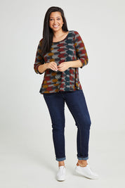 Model Terri-Leigh wearing size 14 of The Printed Jersey 3/4 Sleeve Swing Tee in colour Multiprint (Black), from the front, showing the whole outfit