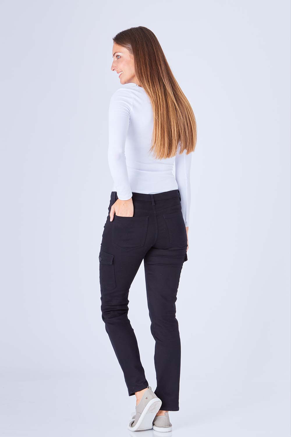 Model Anna wearing size 10 of The Straight Leg Cargo Pant in colour Black (Black), from the back