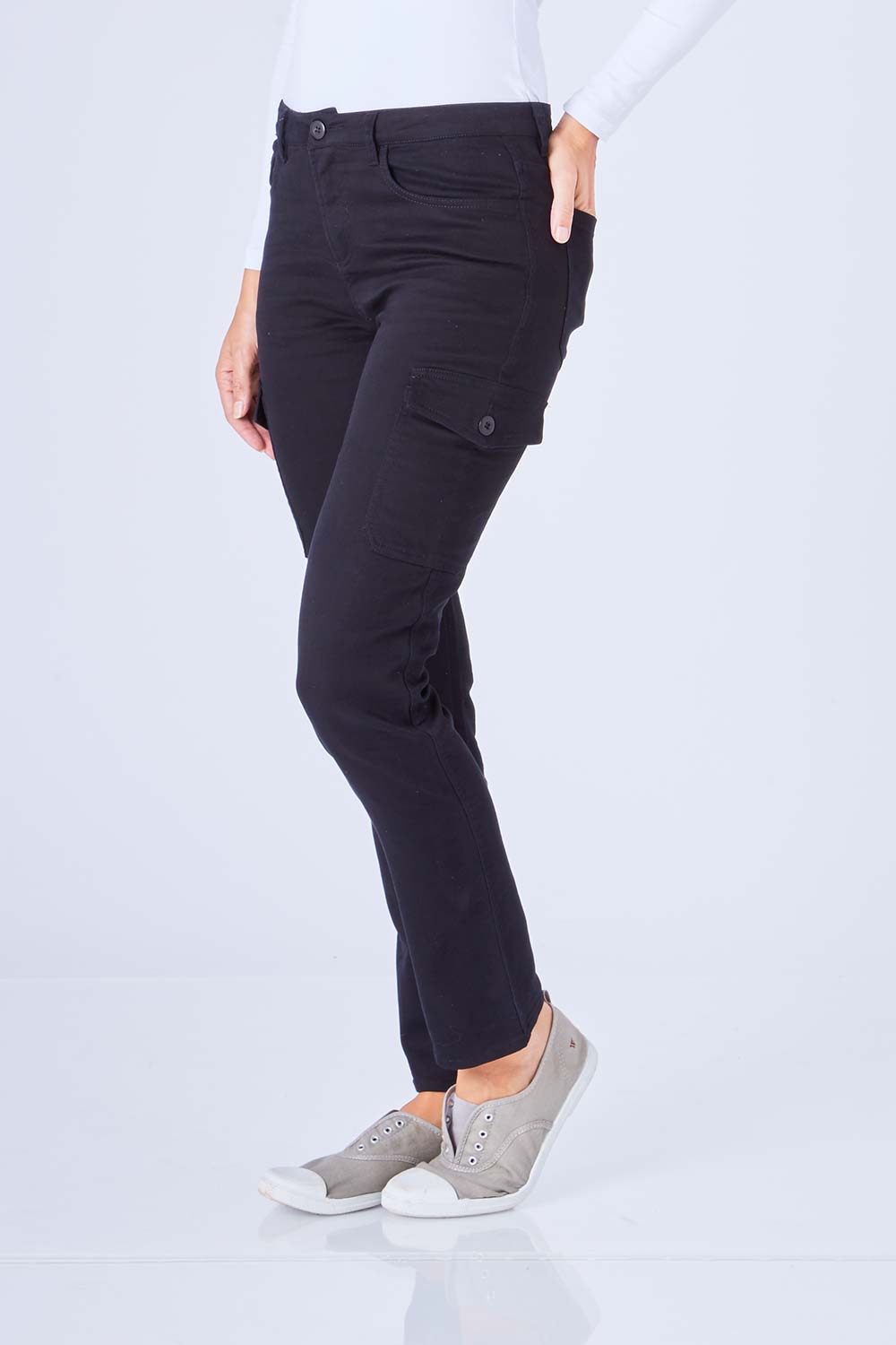 Model Anna wearing size 10 of The Straight Leg Cargo Pant in colour Black (Black), from the front, cropped image