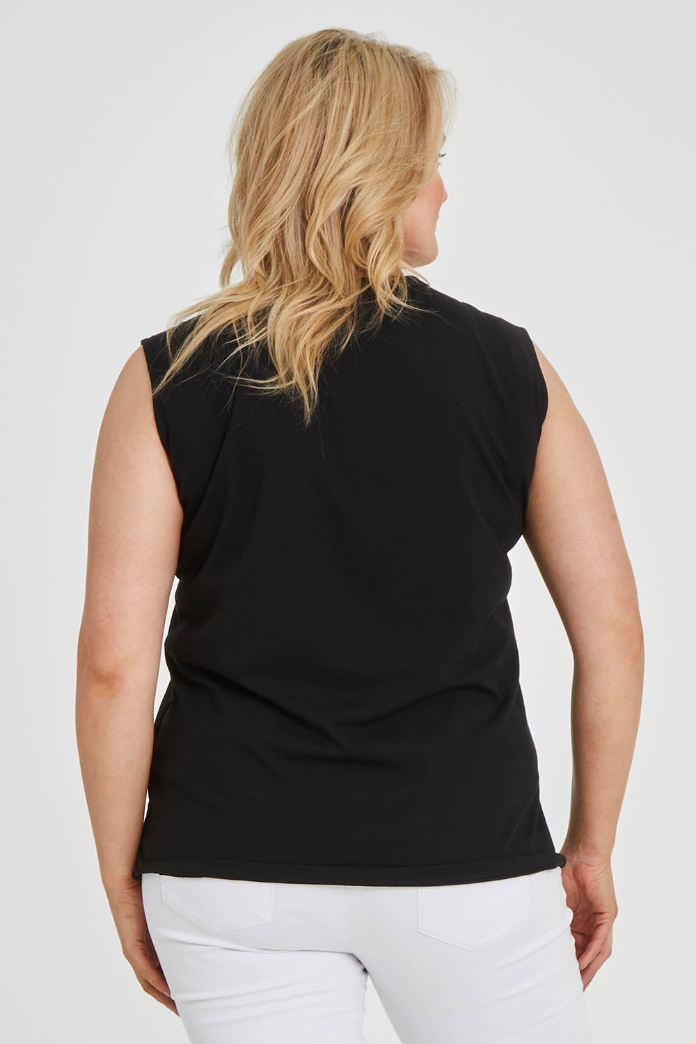 Model Keeara wearing size 16 of The Lace Insert Tank in colour Black (Black), from the back