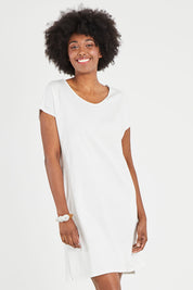 Model Aiyana wearing size 10 of The Luxe Cotton Tee Dress in colour White (White), from the front, cropped image