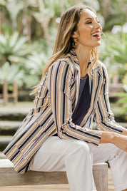 Model Amanda wearing size 10 of The Striped Boyfriend Blazer in colour Camelstrip, from the front, showing the whole outfit
