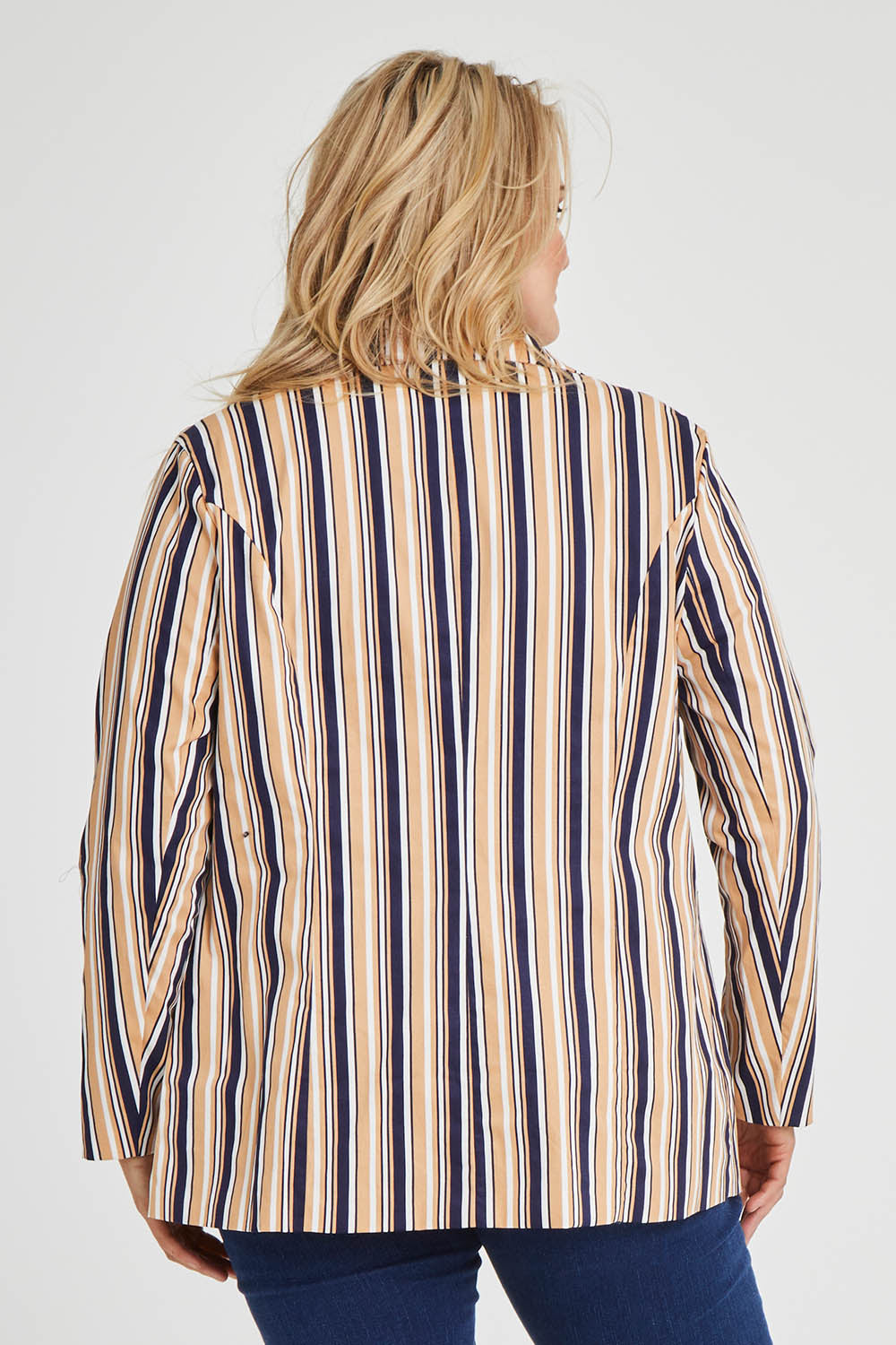 Model Keeara wearing size 16 of The Striped Boyfriend Blazer in colour Camelstrip, from the back