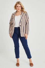 Model Keeara wearing size 16 of The Striped Boyfriend Blazer in colour Camelstrip, from the front, showing the whole outfit