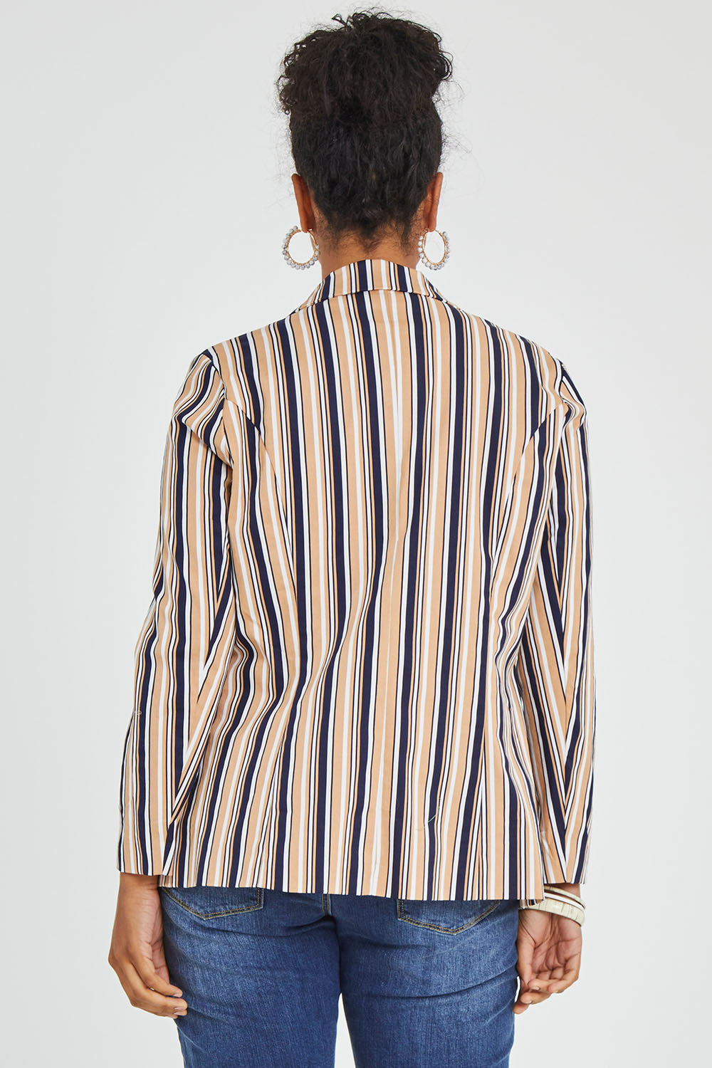 Model Noli wearing size 14 of The Striped Boyfriend Blazer in colour Camelstrip, from the back