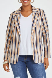 Model Noli wearing size 14 of The Striped Boyfriend Blazer in colour Camelstrip, from the front, cropped image