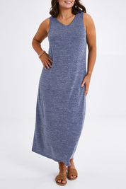 Model Monique wearing size 14 of The Perfect Summer Knit Maxi Dress in colour Denimmarle (Blue), from the front, cropped image
