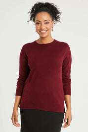 Model Noli wearing size L of The Keepers Soft Round Neck Jumper in colour Firered (Red), from the front, cropped image