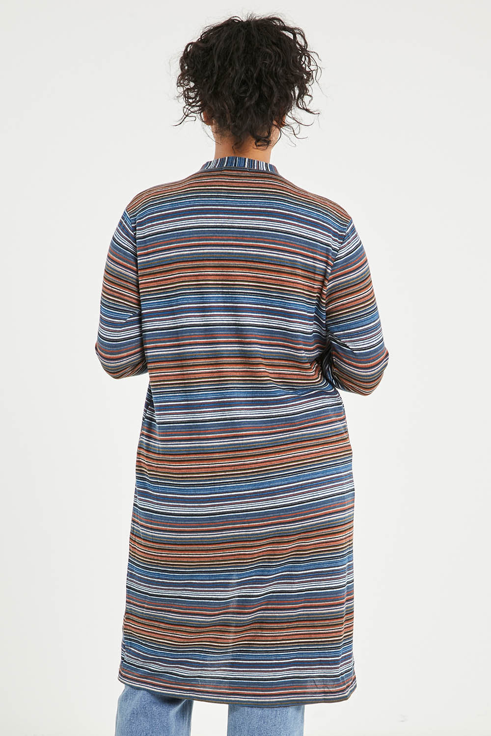 Model Noli wearing size 14 of The Striped Edge To Edge Knit Cardigan in colour Denim (Blue), from the back
